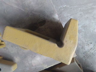 Piezas de desgaste del cucharón de excavadora Ex1200-6 Cubierta del talón Ws300
