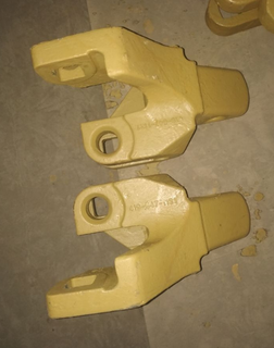 Piezas de excavadoras Adaptador de dientes de cubo 419-847-1131 fundiendo